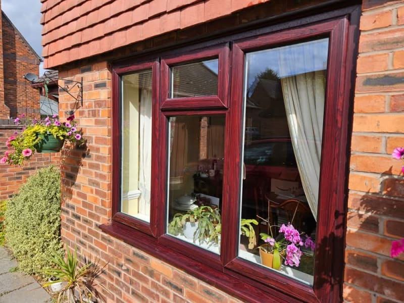 The same cottage window gleaming after a hot pure water clean